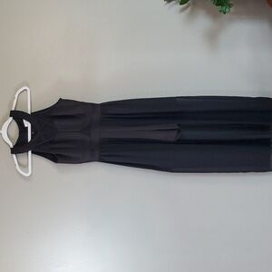 Sweet Storm Blk Jumpsuit W/ Sheer Overlay & Halter Neckline. Medium